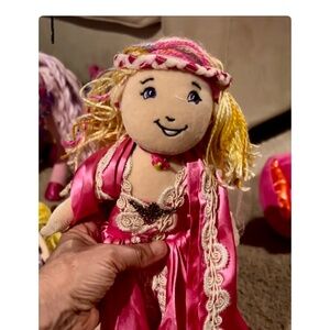 Groovy Girls doll with ballerina outfit and three formal dresses